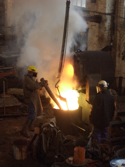 Photo of tapping the furnace, Taylors Earye & Smith